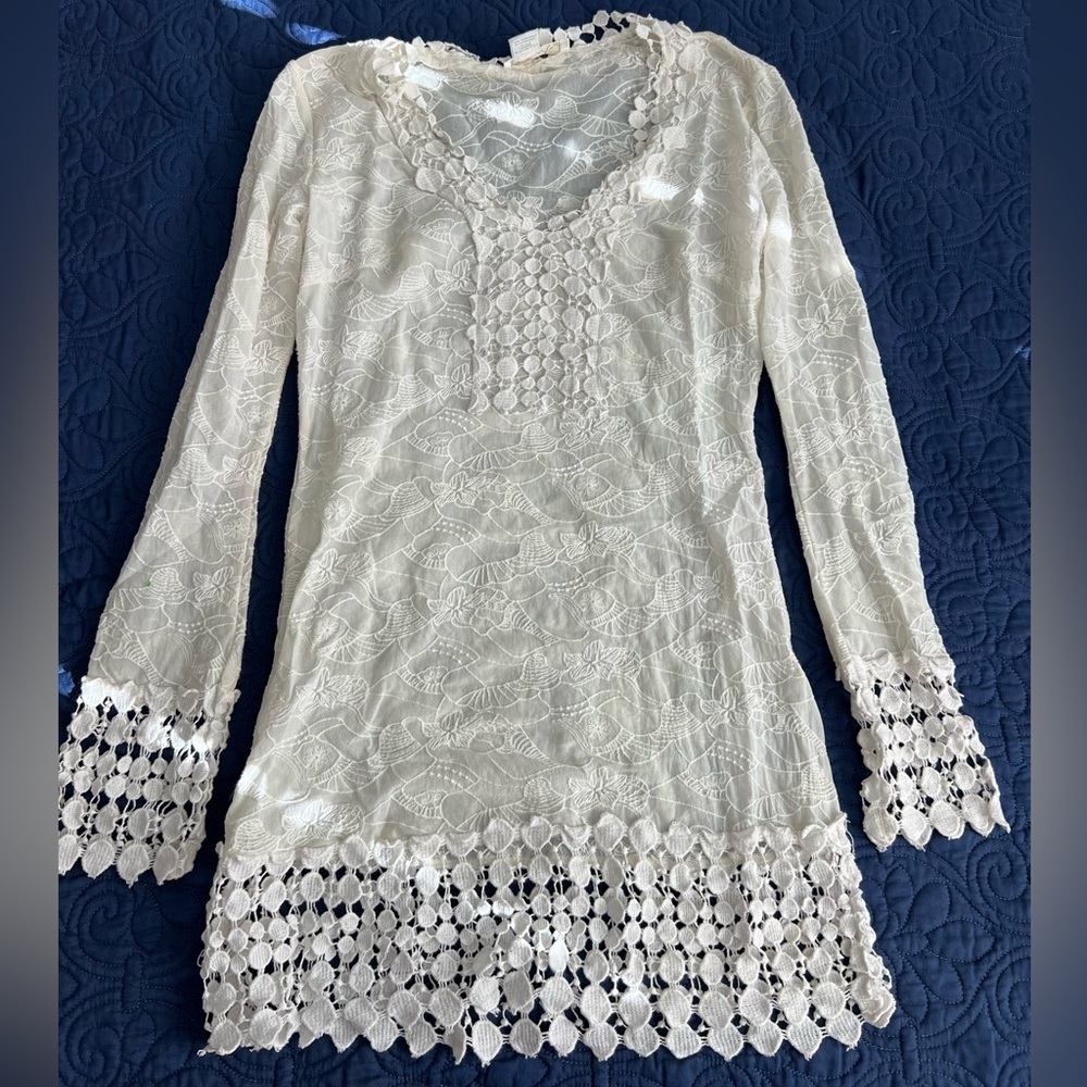 Size small ina brand lace shirt.  White.  Excellent condition. Long sleeve